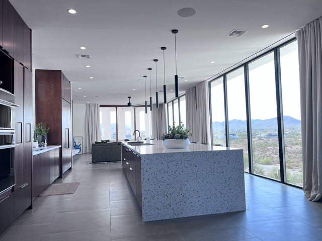 Interior painting project with modern glass walls and clean finish