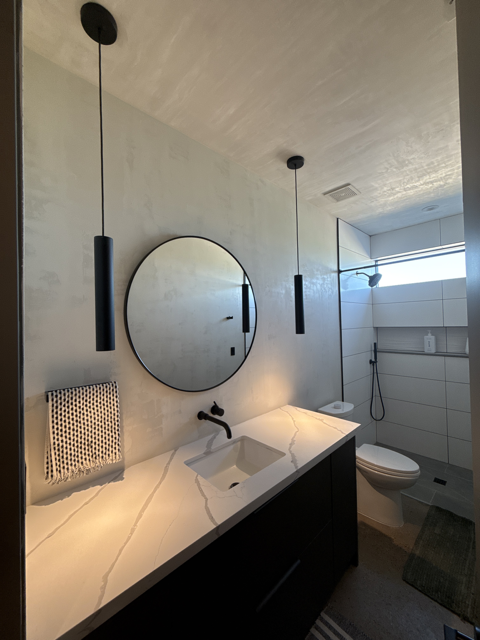 Decorative bathroom wall finish completed by Venzi LLC